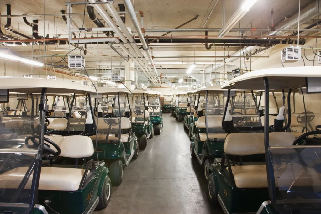 Golf carts in a storage room